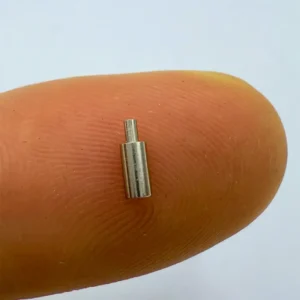 High - precision stainless steel micro rod, CNC machined for use in miniature electronic devices, showcasing fine craftsmanship.