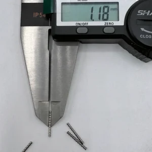 Micro shafts, precision CNC machined, being measured by a digital caliper showing 1.18mm, suitable for high - end electronics.