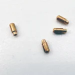 Polished high conductivity brass pins for communication equipment