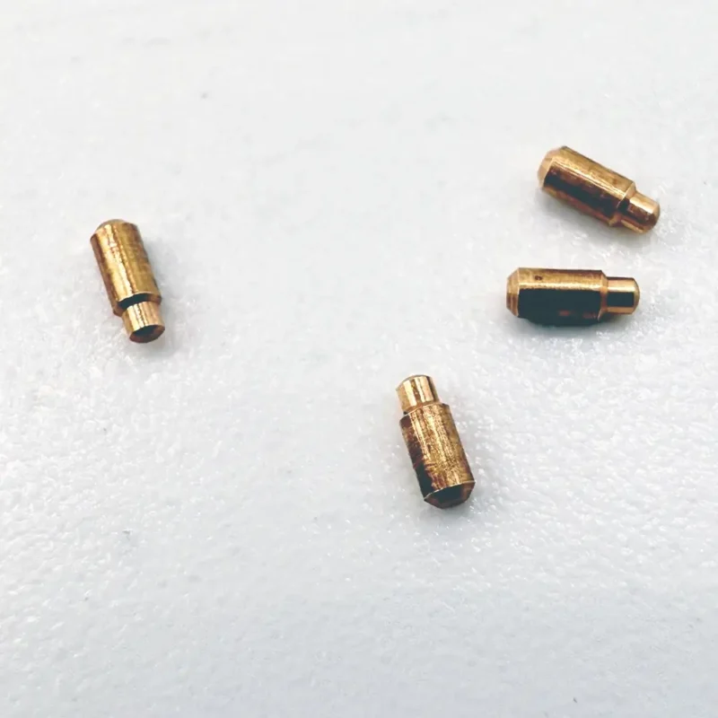 Polished high conductivity brass pins for communication equipment