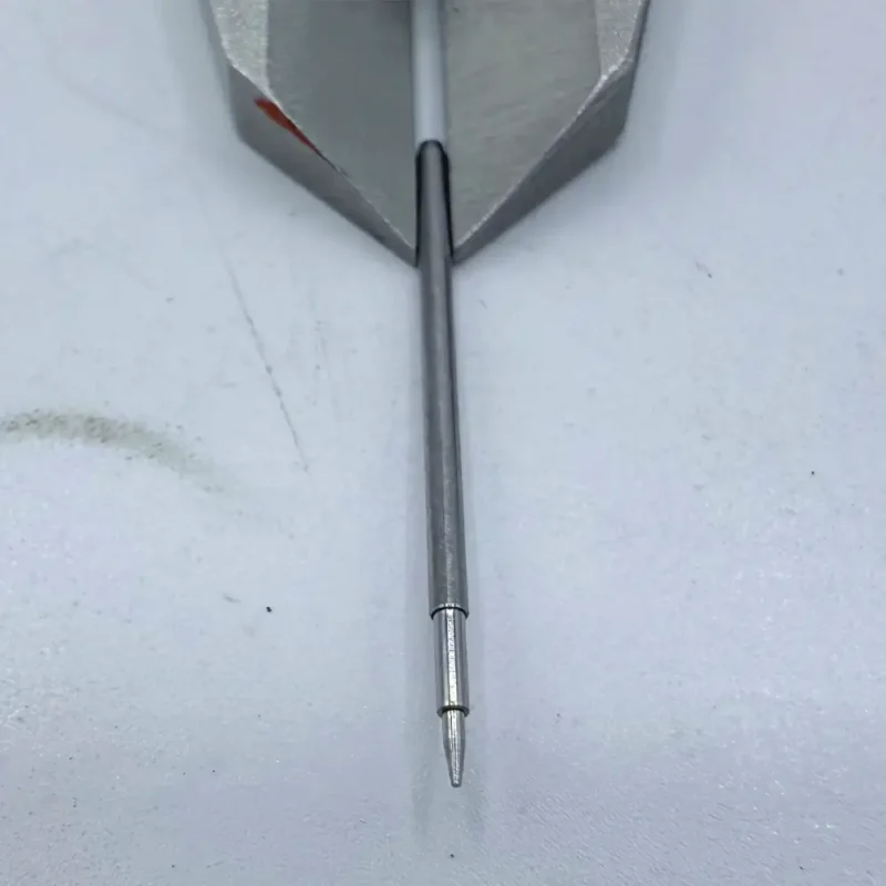 Stainless steel micro needle - shaped shaft, CNC machined for medical instrument applications, featuring a sharp tip.