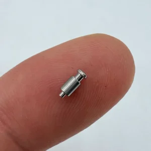 Micro - sized pin - like component made of stainless steel via CNC machining, suitable for compact electronic devices.
