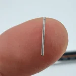 Micro rod made of stainless steel through CNC machining, suitable for miniature electronic devices.