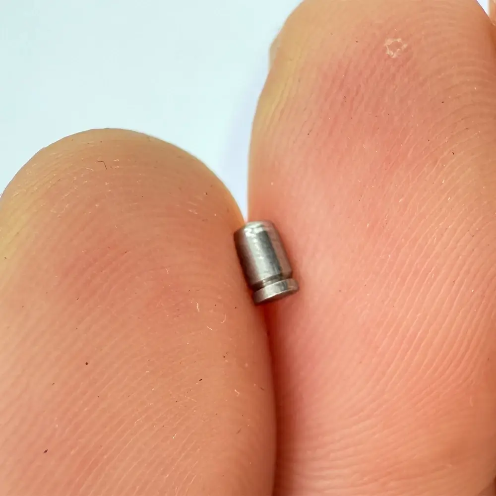 Miniature bushing made of stainless steel through CNC machining, suitable for micro - mechanical assemblies.