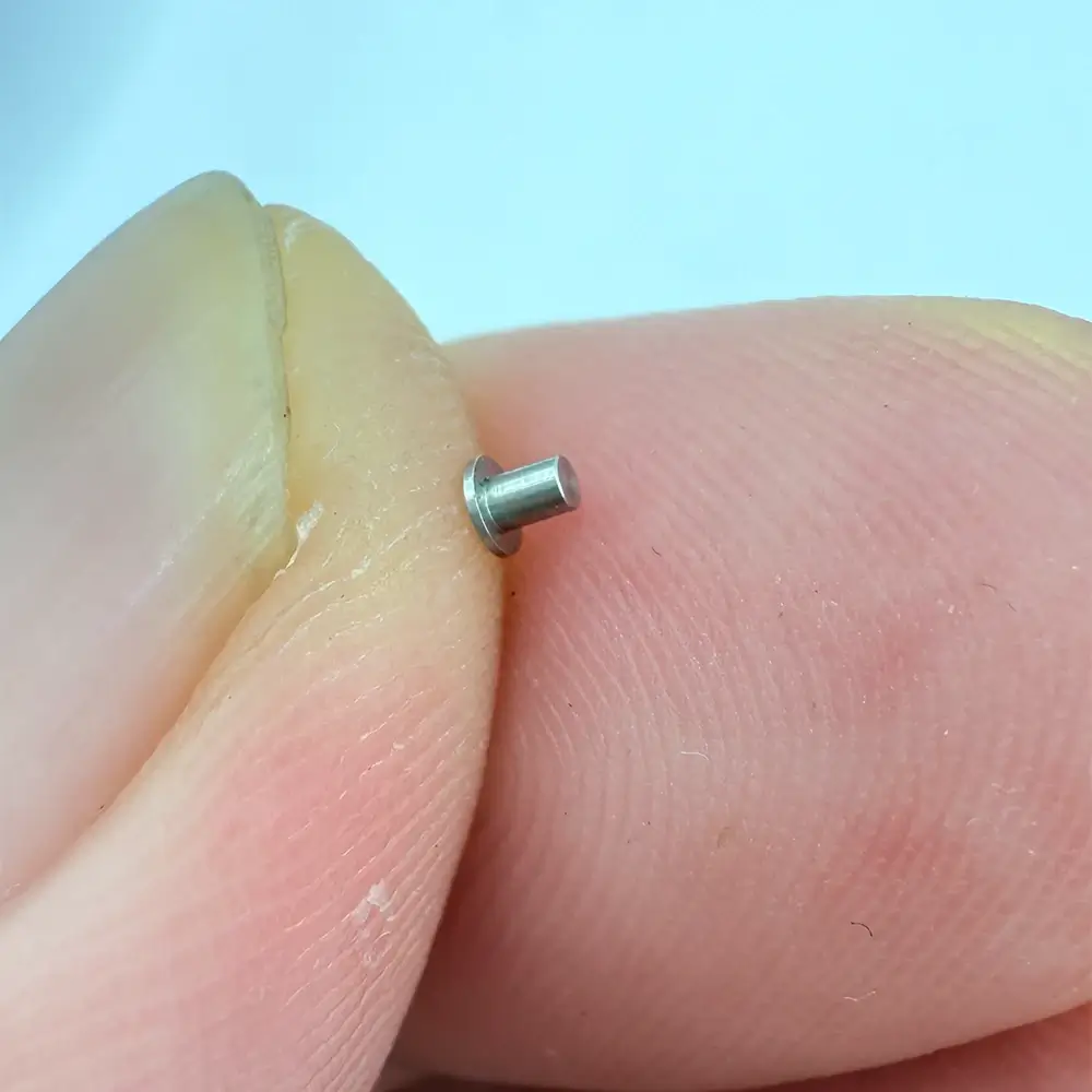 Miniature pin made of stainless steel via CNC machining, suitable for micro - electronics.