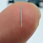 Digital caliper measuring the diameter of a precision micro pin