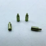 Assortment of polished steel step pins on display