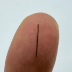 Swiss turned brass micro component