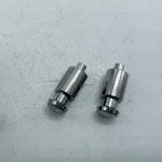 Two stainless steel precision turned shafts